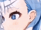 a close up of a blue haired anime girl 's face with blue eyes .