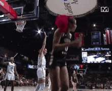 a basketball game is being played at the arena