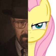 a man with a beard and glasses is standing next to a pony with pink hair and blue eyes .