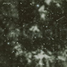 the word xos is on a dark background with snow