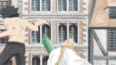 a man without a shirt stands in front of a building