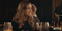 Smiling Kirsten Prout GIF
