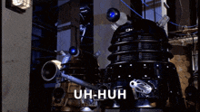 two dalek robots standing next to each other with uh-huh written on the bottom right