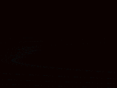 a blurry picture of a circle with a light in the middle