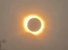 the sun is partially obscured by the moon during a partial solar eclipse
