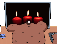 three candles are lit up in front of a computer screen
