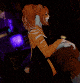 a woman in a cat costume is posing for the camera