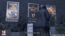 a sign that says you 're in good hands is hanging on a wall