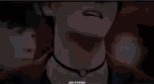 a pixelated image of a person standing next to a swimming pool with the words jin.myxng on the bottom right