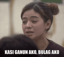 a close up of a woman 's face with the words kasi ganun ako , bulag ako written on it .