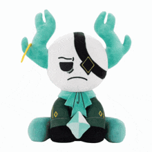 a stuffed animal with a sad face and antlers is sitting on a white background