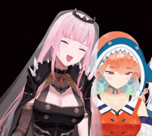 two anime girls are posing for a picture and one has a shark hood on