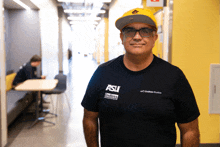 a man wearing a black shirt that says asu endless studios