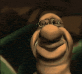 a cartoon worm wearing glasses is smiling for the camera