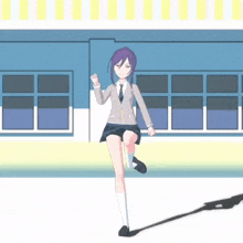 a girl in a school uniform is dancing in front of a building