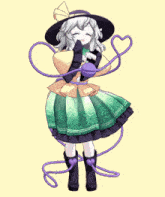 a girl in a green dress and a black hat is dancing