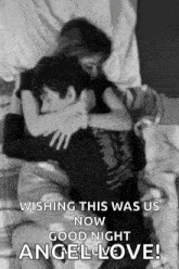 a black and white photo of a man and a woman hugging each other .