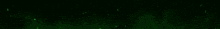 a close up of a green light beam on a black background