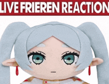 a stuffed doll with blue hair and red earrings stands in front of a sign that says live frieden reaction