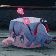 a cartoon character is laying on the ground with pink flowers on her head