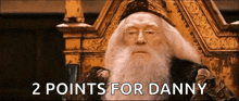 a man with a beard is sitting in a chair with the words 2 points for danny