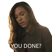 a woman in a brown jacket with the words " you done " on her face