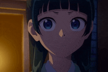 a girl with green hair and blue eyes looks at the camera