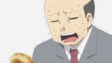 a man in a suit and tie is holding a loaf of bread with his mouth open .