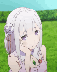 a girl with white hair and purple eyes is sitting in a field