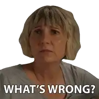 a woman with a surprised look on her face and the words what 's wrong