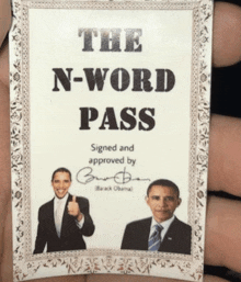 a card that says the n-word pass on it
