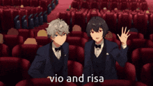 two anime characters are sitting in an auditorium with the words vio and risa written below them
