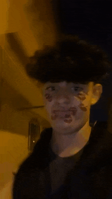 a person with a sticker on their face that says ' love '