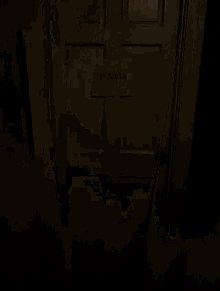 a white door with a sign on it that says " escuela "