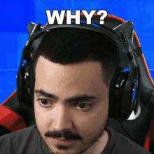 a man wearing headphones with cat ears says why in white letters