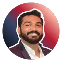 a man with a beard is smiling in a circle with a red and blue background