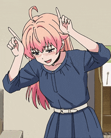 a girl with pink hair and a blue shirt is pointing upwards