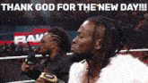 two men in a wrestling ring with the words thank god for the new day written above them