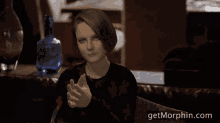 a computer generated image of a woman with the website getmorphin.com in the lower right corner
