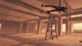 a man is falling from a ladder with gifrun.com written below him