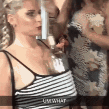 a woman in a striped tank top says um what in a snapchat video