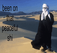 a man in a black robe stands in the desert with the words been on that peaceful shi below him