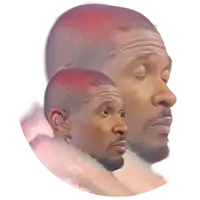 a man with red hair and a beard looks down