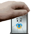 a hand is holding a broken cell phone with a pacifier on the screen .