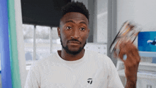 Throwing The Phone Marques Brownlee GIF - Throwing The Phone Marques Brownlee Tossing Away The Phone GIFs