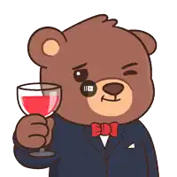 a teddy bear wearing a suit and bow tie holds a glass of wine
