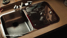 a picture of a kitchen sink with the conjuring last rites on the bottom