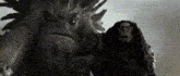 a man and a dragon are standing next to each other .