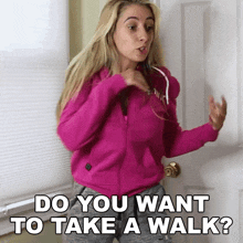 a woman in a pink jacket is standing in front of a door and asking if she wants to take a walk