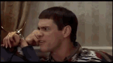 Dumb And Dumber Hand Cuffed GIF - Dumb And Dumber Hand Cuffed Silly GIFs